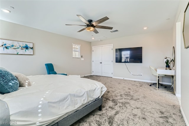 bedroom with a closet, ceiling fan, and carpet floors