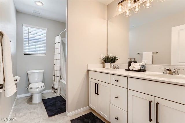 full bathroom with shower / bath combo with shower curtain, tile patterned flooring, toilet, and vanity