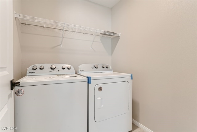 laundry room featuring independent washer and dryer