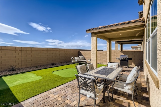 view of patio with area for grilling