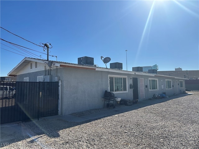 view of front of house with central air condition unit