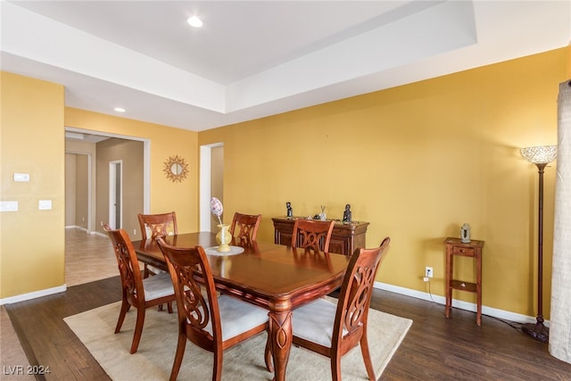 dining space featuring dark hardwood / wood-style flooring