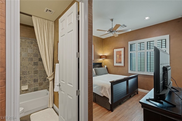 bedroom featuring light wood-type flooring and ceiling fan