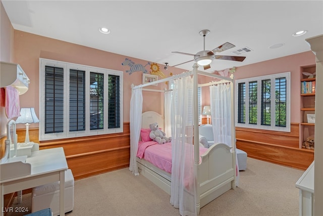 carpeted bedroom with ceiling fan