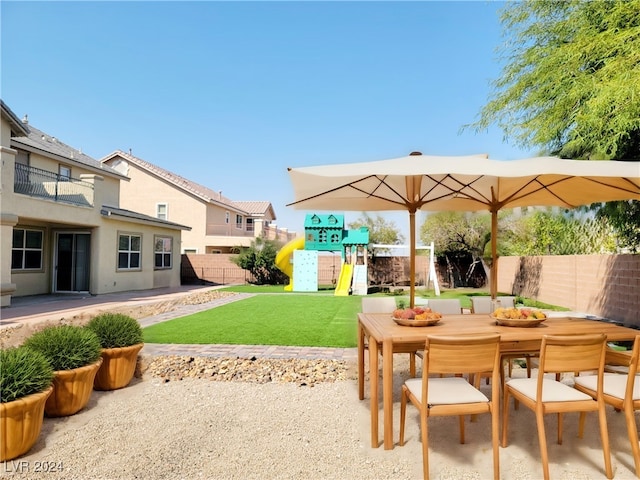 view of patio with a playground