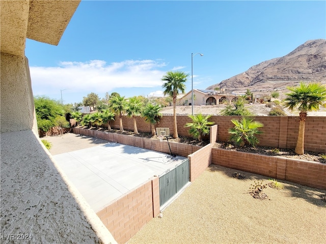 view of patio / terrace with a mountain view