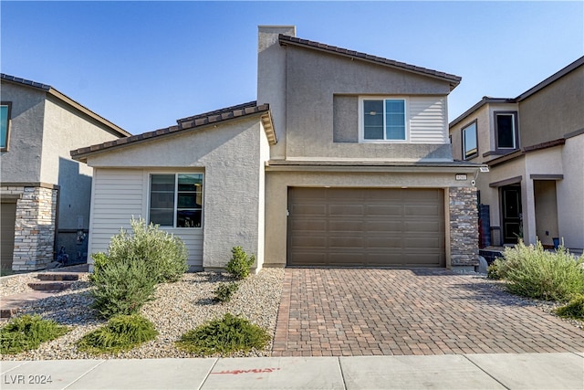 view of front of property featuring a garage