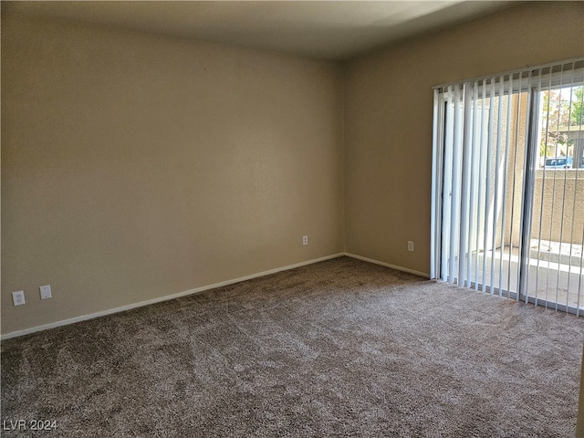 view of carpeted spare room