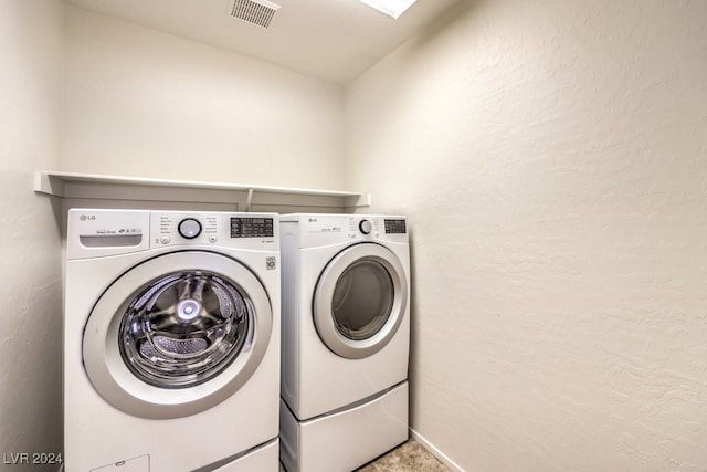 washroom featuring separate washer and dryer