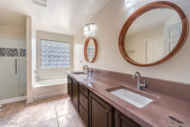 bathroom featuring vanity, separate shower and tub, and tile patterned flooring