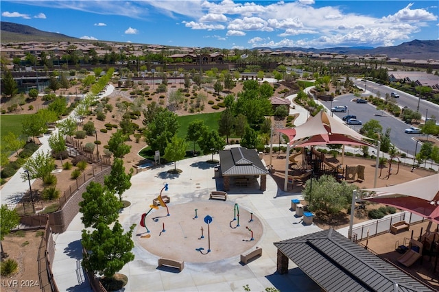 birds eye view of property with a mountain view