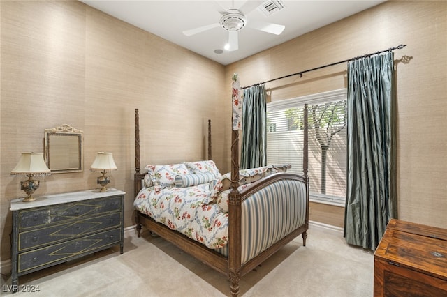 carpeted bedroom with ceiling fan