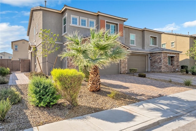 view of front of property with a garage