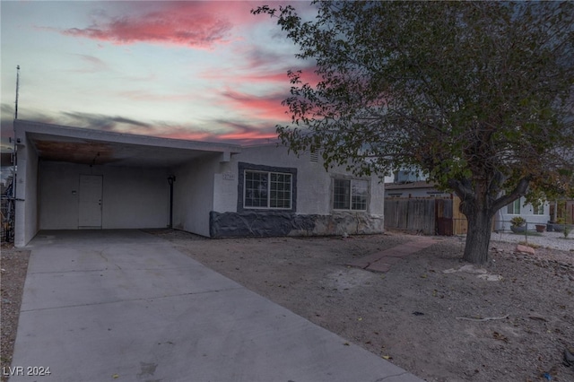 view of front facade featuring a carport