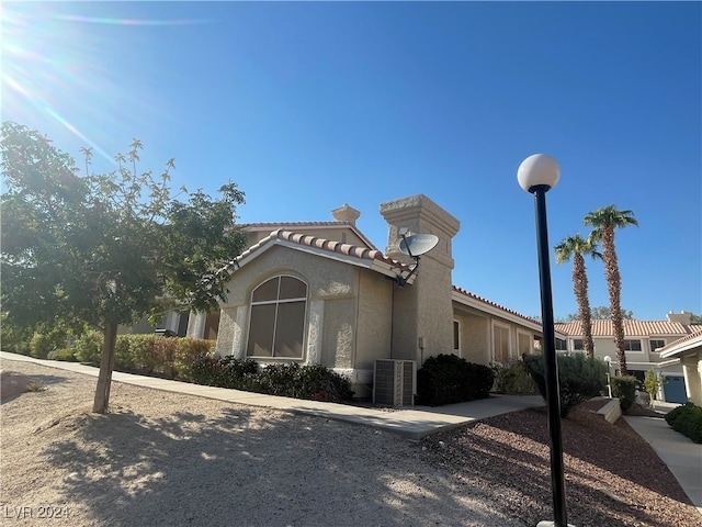 view of front of property with central AC