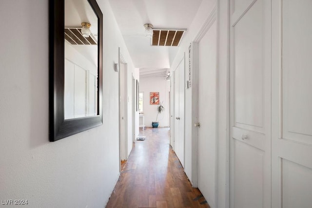 hallway with light wood-style flooring and visible vents