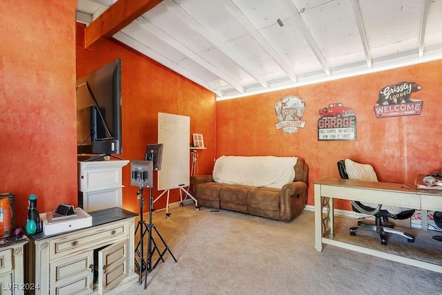 carpeted living area with vaulted ceiling with beams