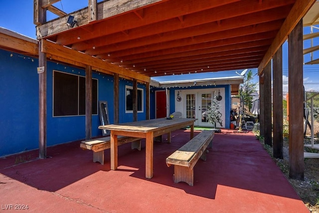 view of patio / terrace featuring outdoor dining area and french doors