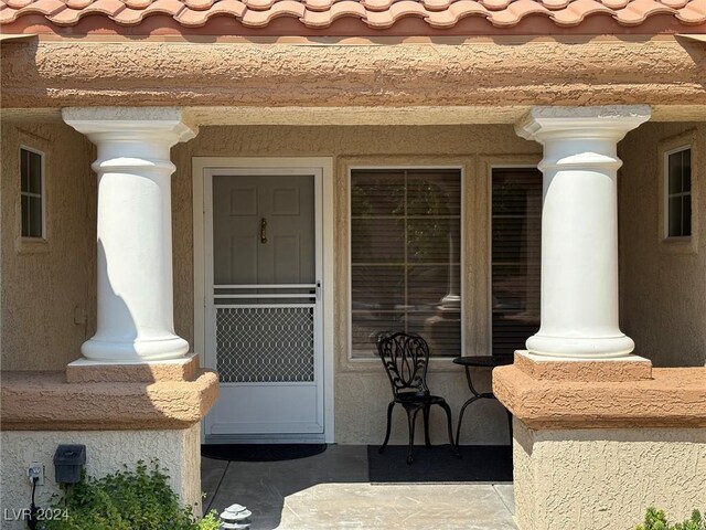 property entrance with a porch