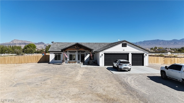 view of front of house featuring a mountain view