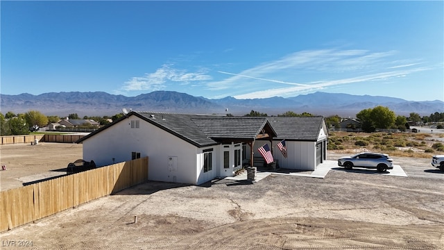 view of front of property with a mountain view