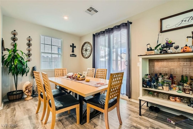 dining room featuring light wood-type flooring