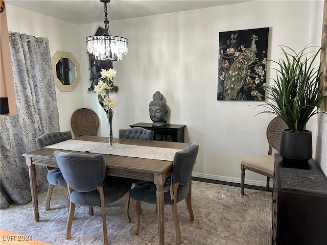 dining area with a chandelier