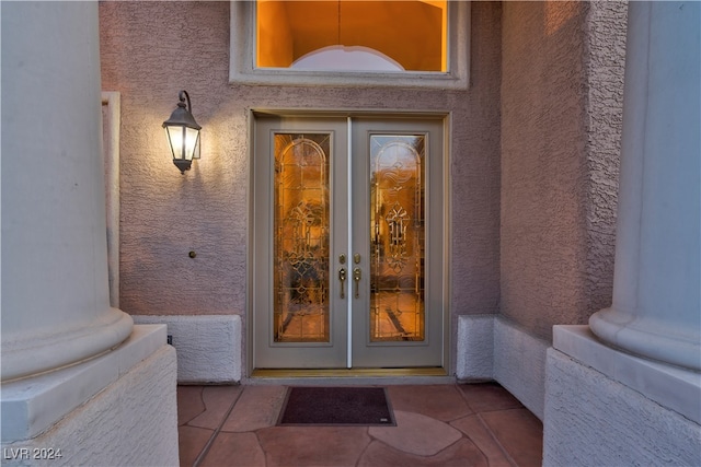 view of exterior entry with french doors