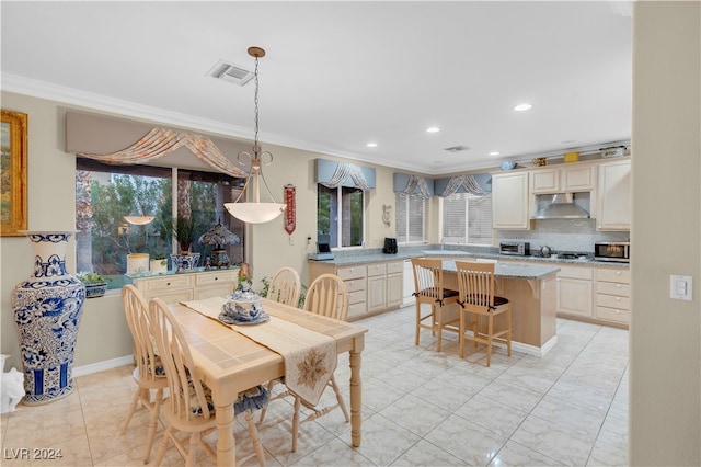 dining room with crown molding