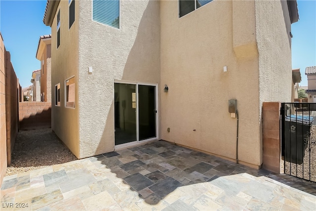 back of house with a patio area