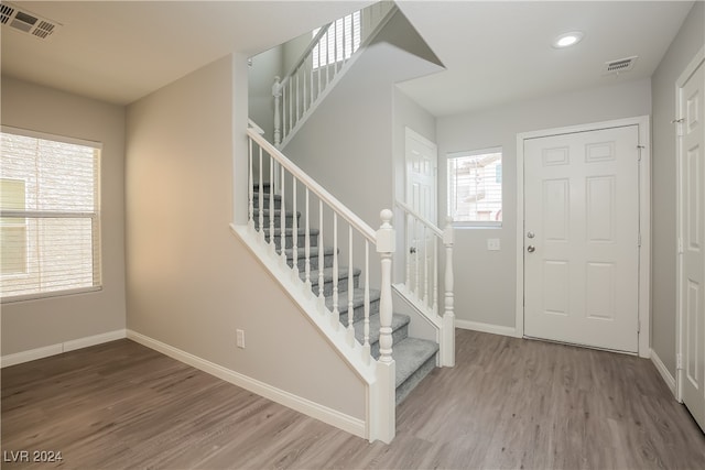 entrance foyer featuring hardwood / wood-style flooring