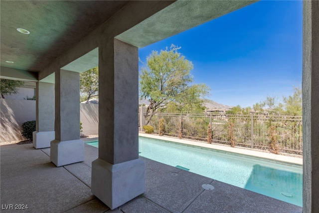 view of pool featuring a patio