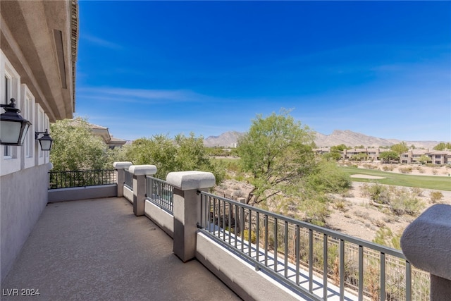 balcony featuring a mountain view