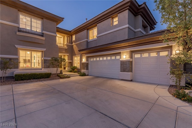 view of front of property with a garage