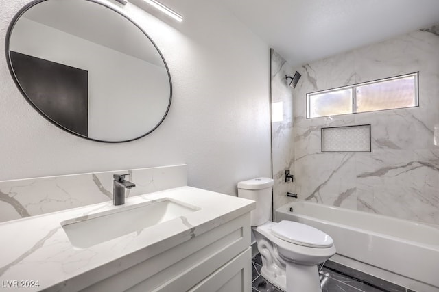 full bathroom with tiled shower / bath combo, vanity, and toilet