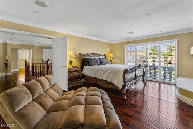 bedroom featuring dark wood-type flooring, a textured ceiling, access to outside, and ornamental molding