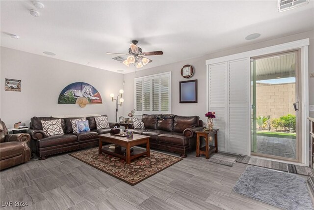 living room with ceiling fan