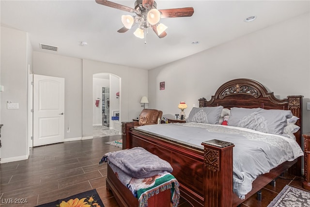 bedroom featuring ceiling fan and dark hardwood / wood-style flooring