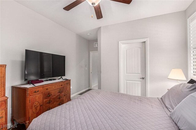 bedroom featuring ceiling fan