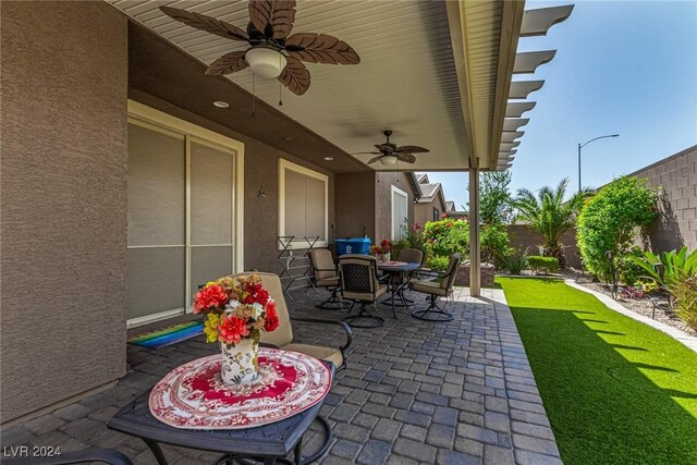 view of patio / terrace with ceiling fan