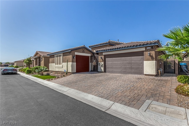 view of front of property with a garage