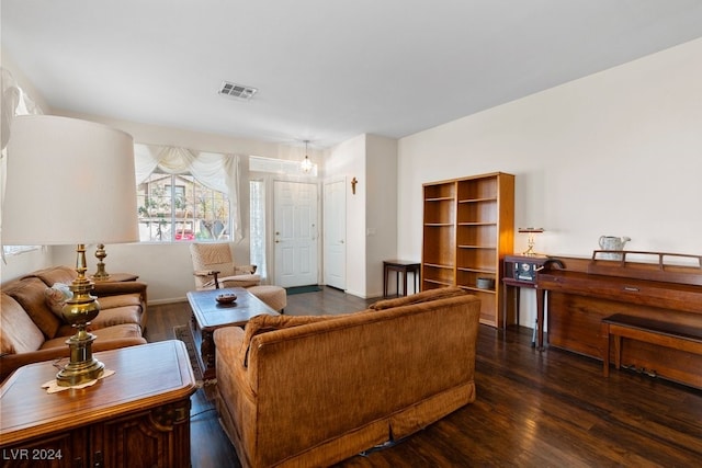 living room featuring dark hardwood / wood-style floors