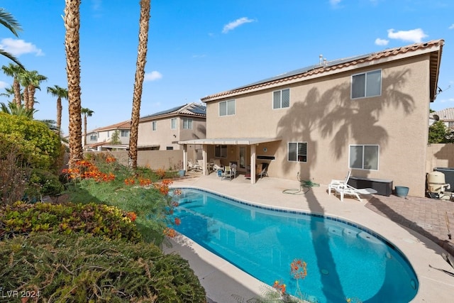 rear view of property with a patio area