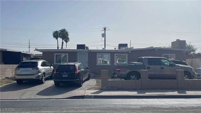 view of front of house with central air condition unit