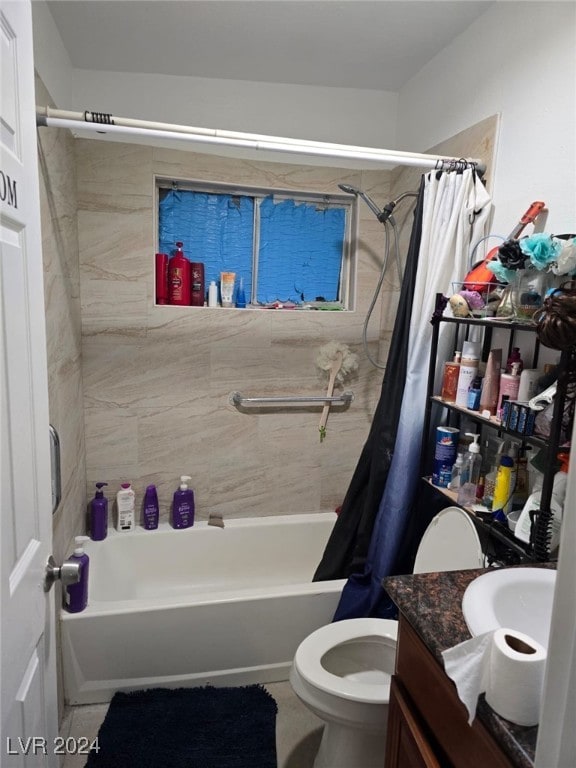 full bathroom featuring vanity, toilet, and shower / tub combo