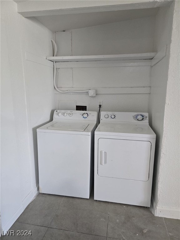 laundry area with washing machine and dryer