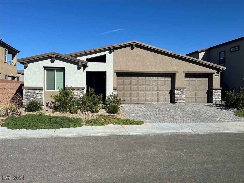 view of front of property with a garage