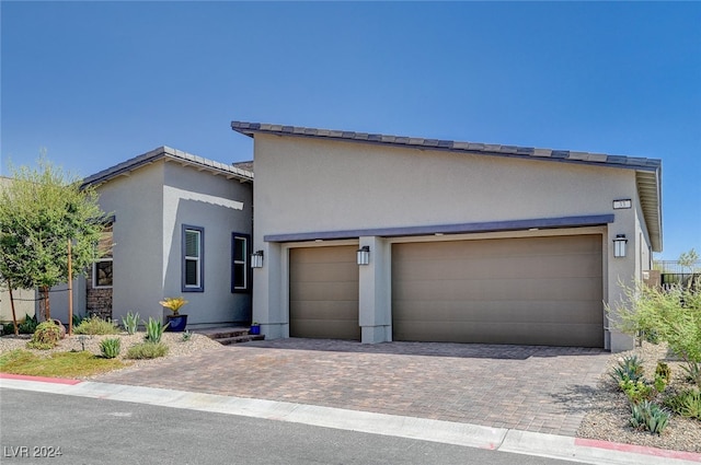 view of front of property featuring a garage