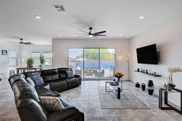 living room featuring ceiling fan