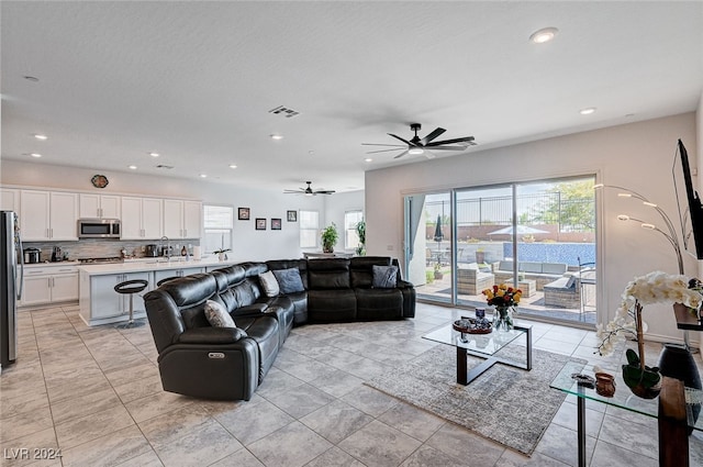 living room featuring ceiling fan